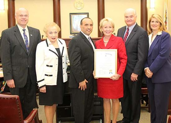 The Board of Chosen Freeholders present a proclamation for Alcohol Awareness Month to Mary Pat Angelini, Executive Director of Prevention First. 